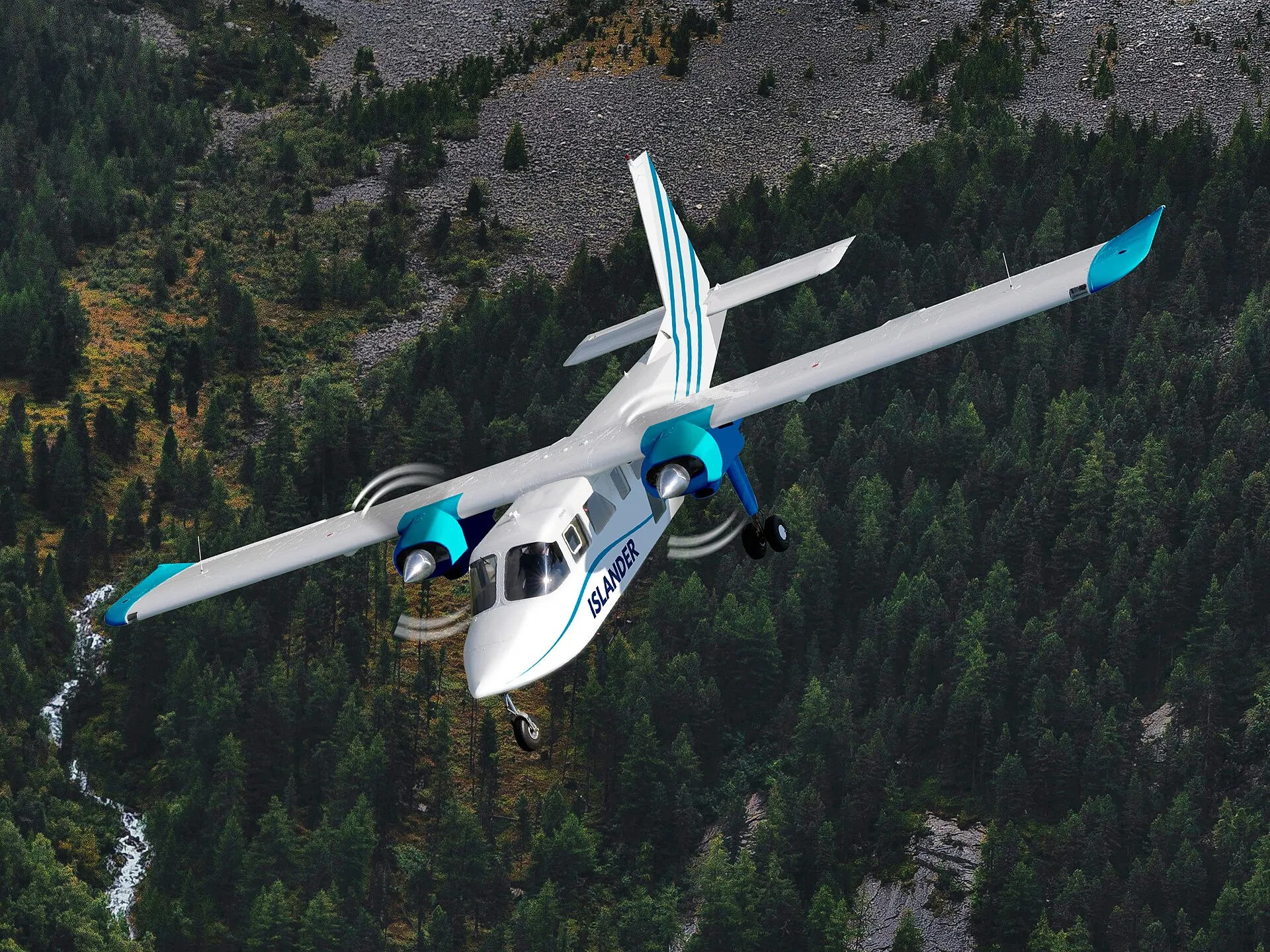 Britten-Norman Islander im Flug über bewaldeten Bergen